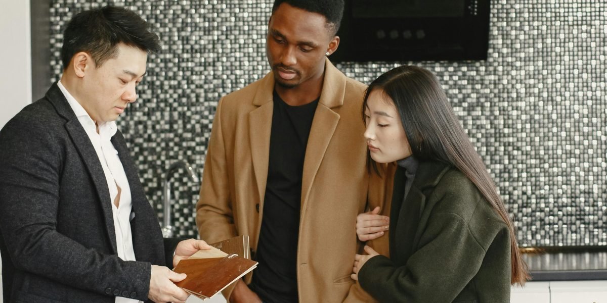 A professional real estate advisor discussing property options and legal requirements with a client.