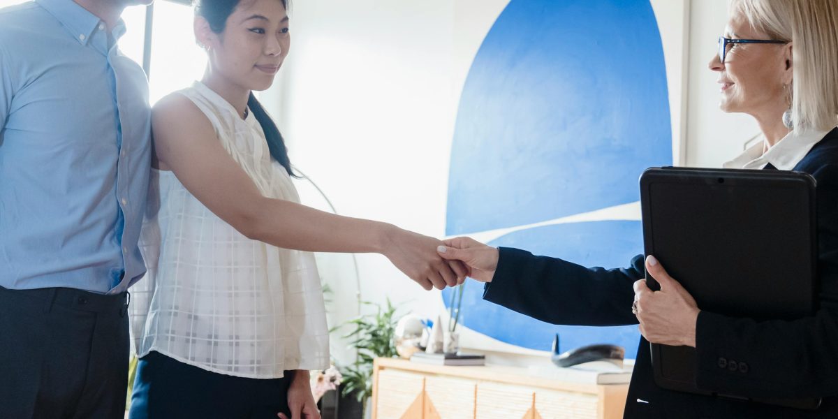 Illustrating the moment of completing a property purchase, signifying a successful transaction.