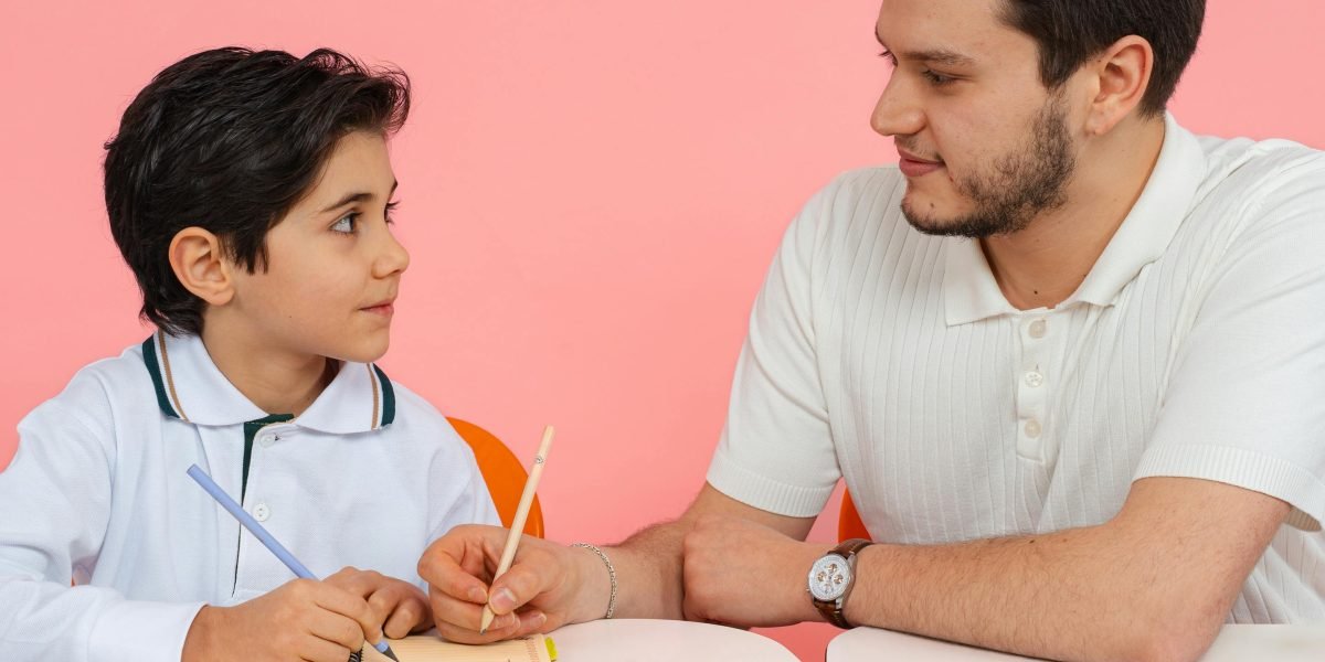 Parents engaging in a conversation with a school advisor or counsellor, discussing educational options for their child.
