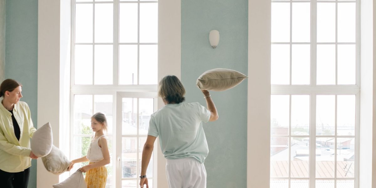 A family enjoying their new residence, highlighting the importance of choosing the right community.