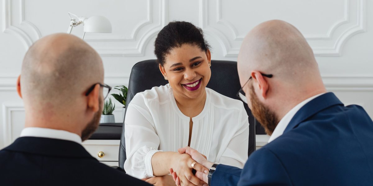 A client consults with a real estate expert, receiving guidance on property investment in Dubai.
