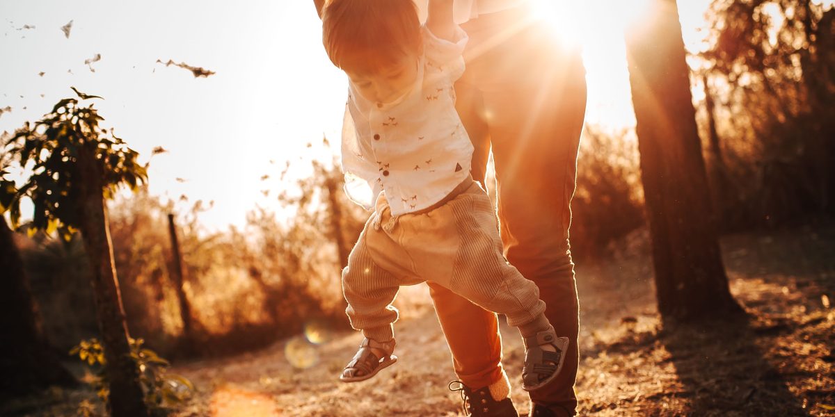 A family enjoying quality time outdoors, highlighting the world-class lifestyle offered in Dubai.